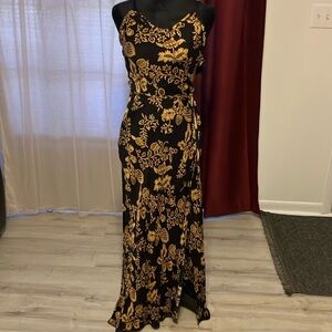 This full length dress is ready for a night out in the town.